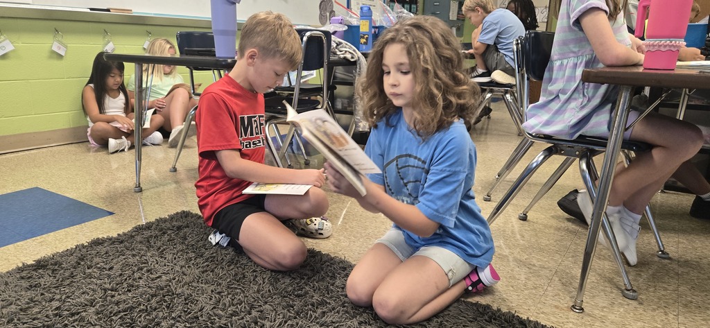 Second graders partner reading