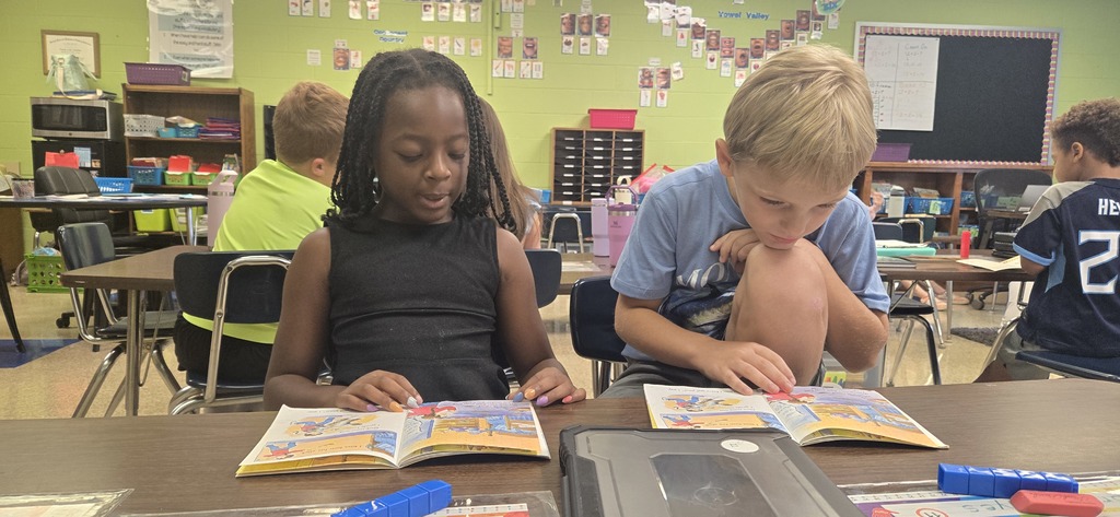 Second graders partner reading