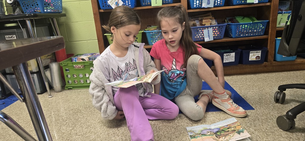 Second graders partner reading