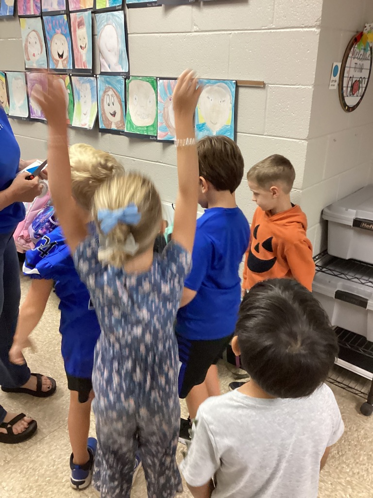 Students on a shape scavenger hunt