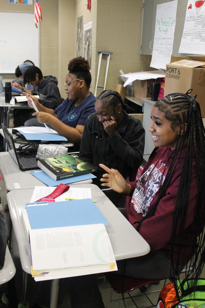 Future authors writing essays in English Class