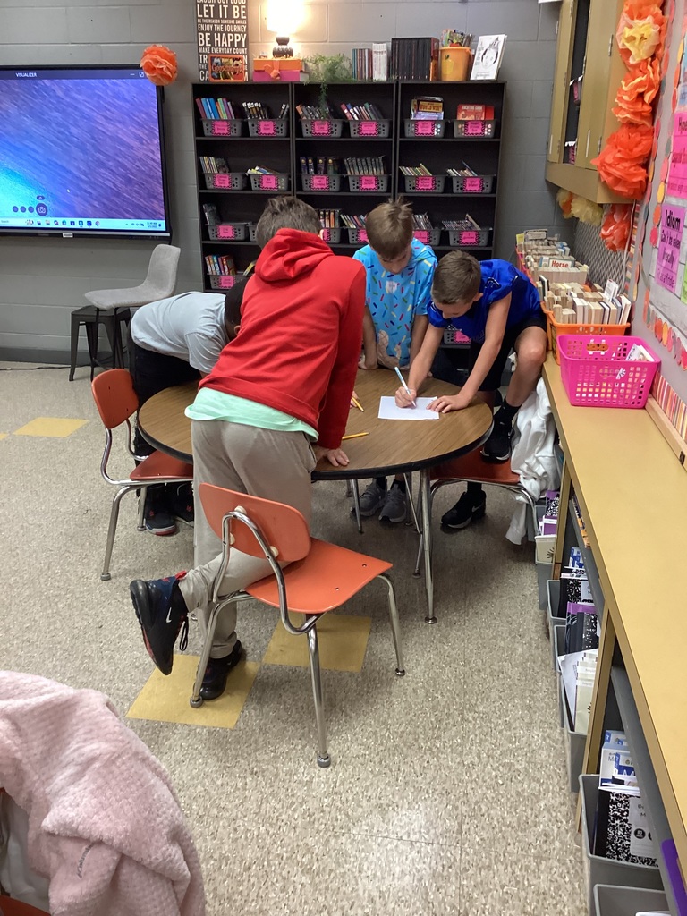 Students working on their volume zoo animals