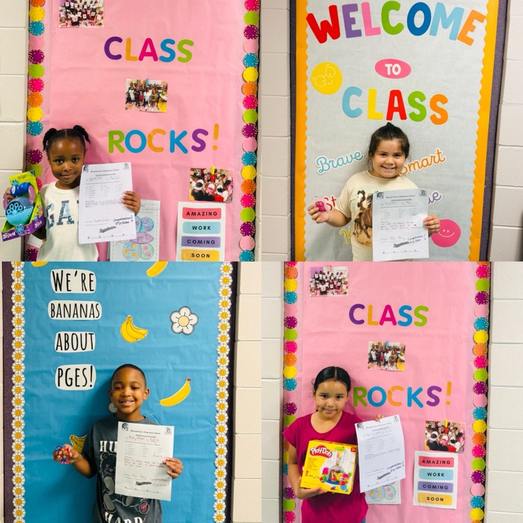 A picture of 4 students that earned a Positive Office Referral.