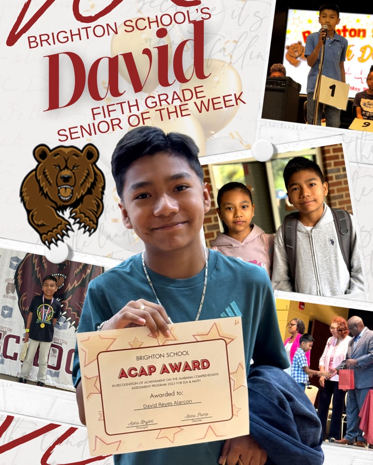 student smiling and holding an award