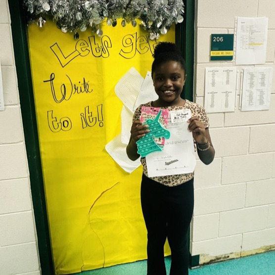 A picture of a student that earned a Positive Office Referral.