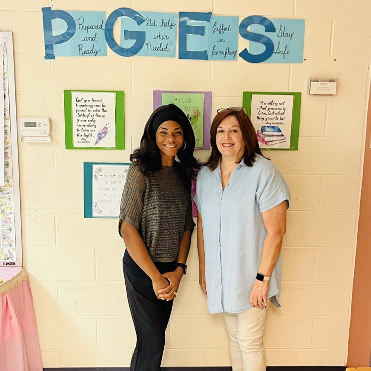 Mrs. Veasey and Mrs. Jeffreys posing for a picture for Instructional Coaches Day.