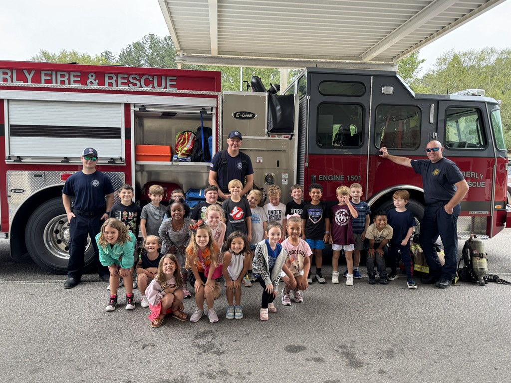 Mrs. Bowen's class with the Kimberly Fire Department' s fire truck