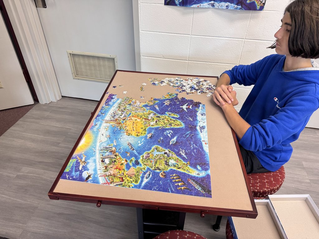 student working puzzle