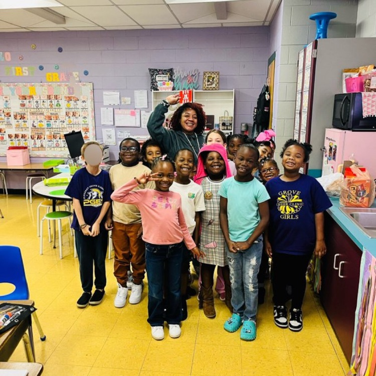 A picture of Ms. Ford and her students.