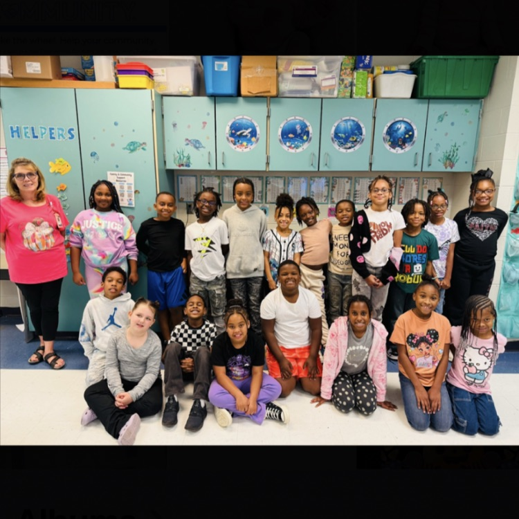 A picture of Ms. Eaton and her students.