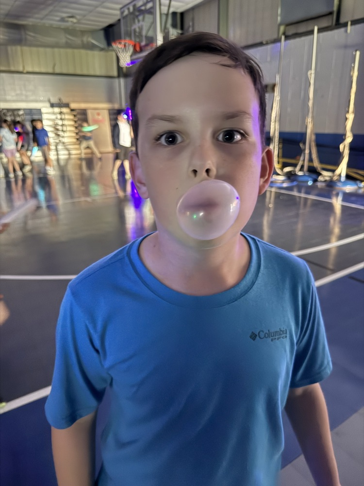 students blowing a bubble 