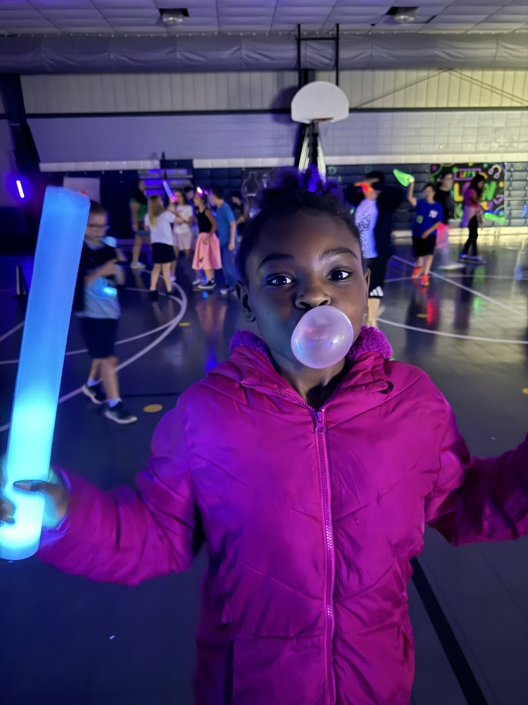 students blowing a bubble 
