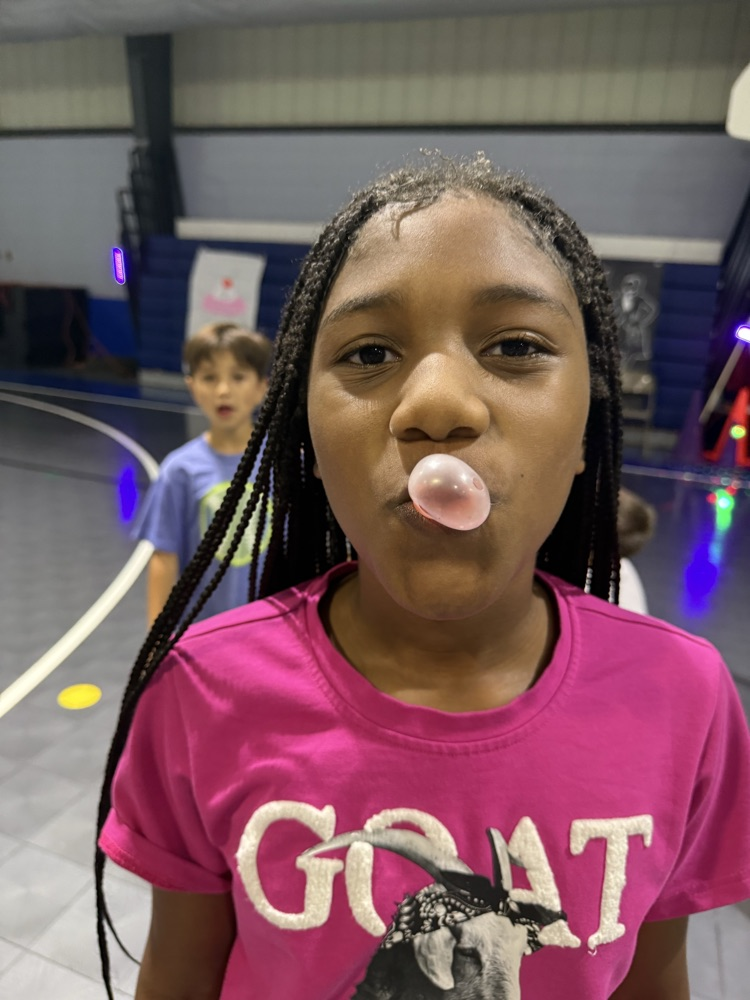 students blowing a bubble 