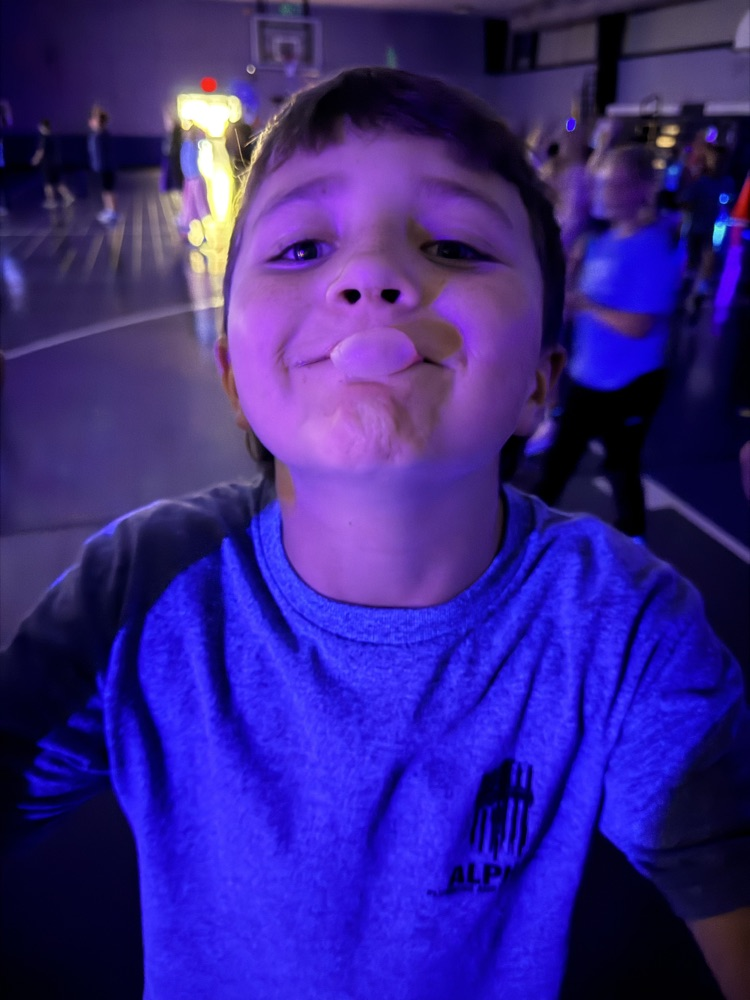 students blowing a bubble 