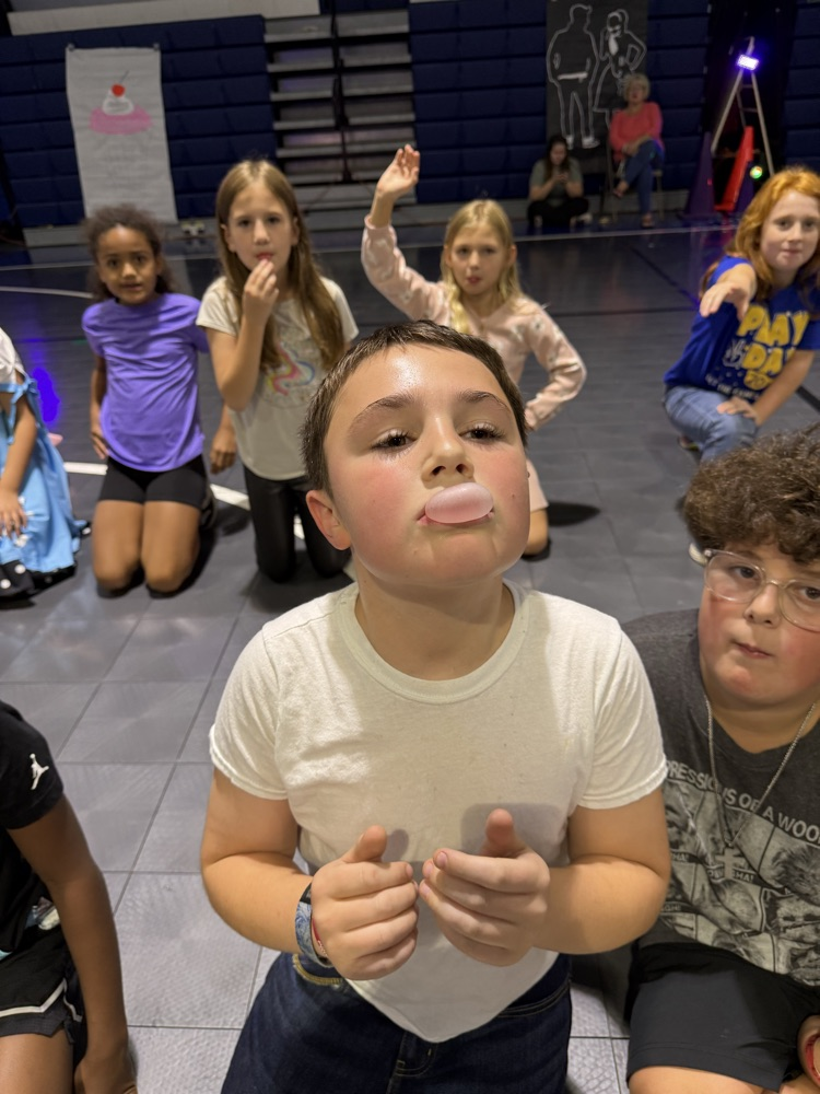 students blowing a bubble 