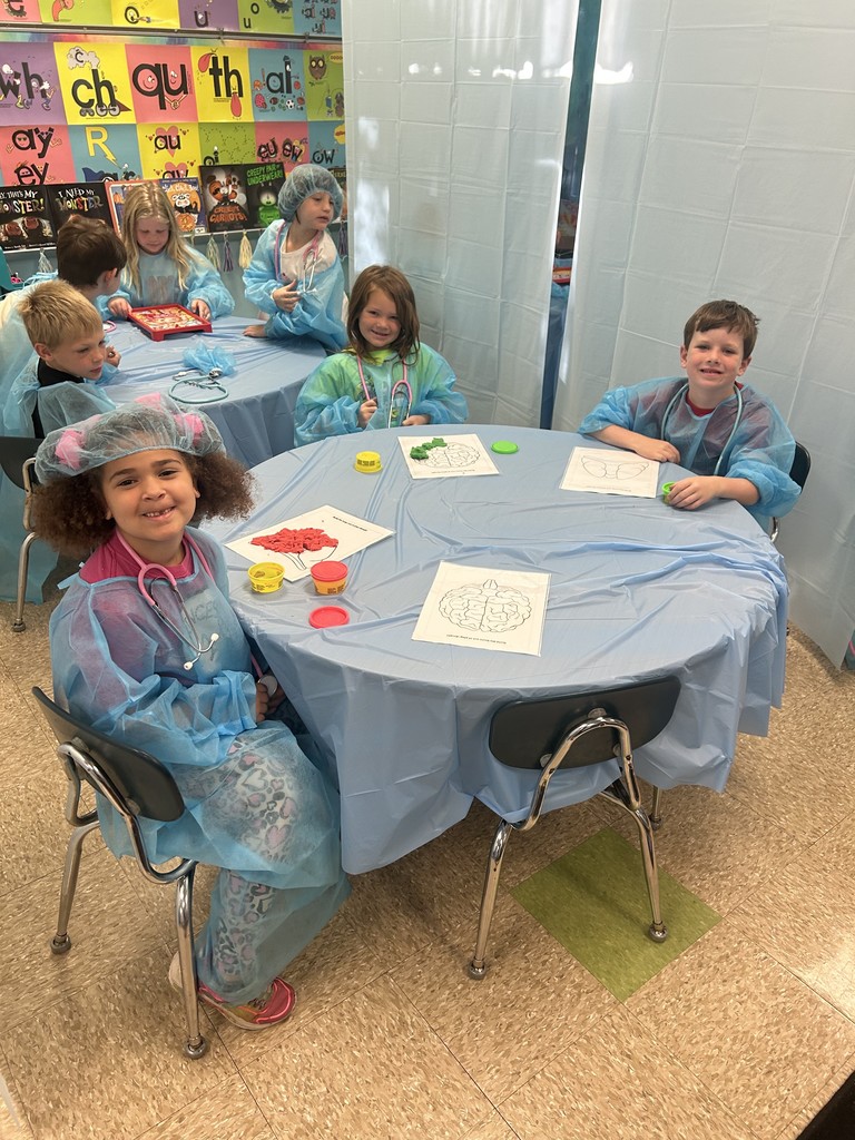 Students dressed as surgeons