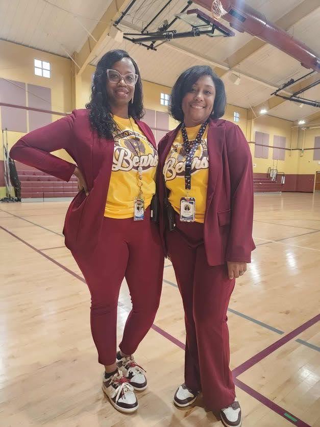 Teachers dressed as twins