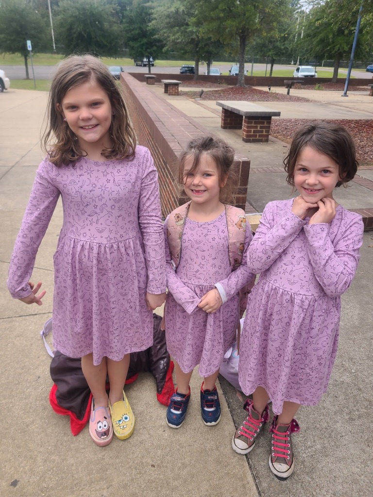 Students dressed as triplets