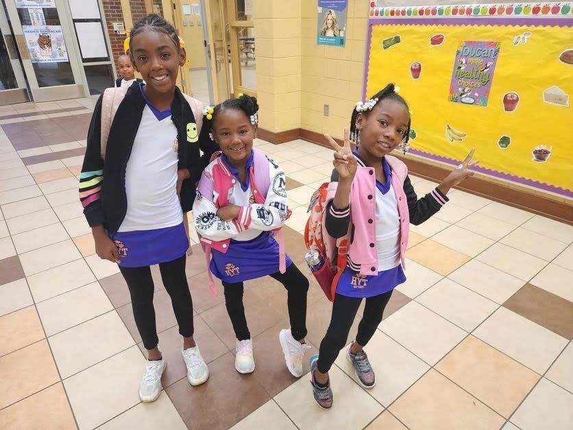 Students dressed as triplets