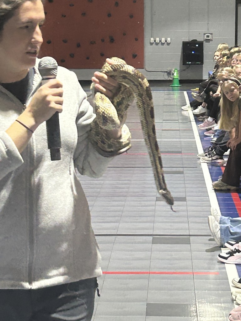 Emily Hutto from Jefferson County Greenway with snake