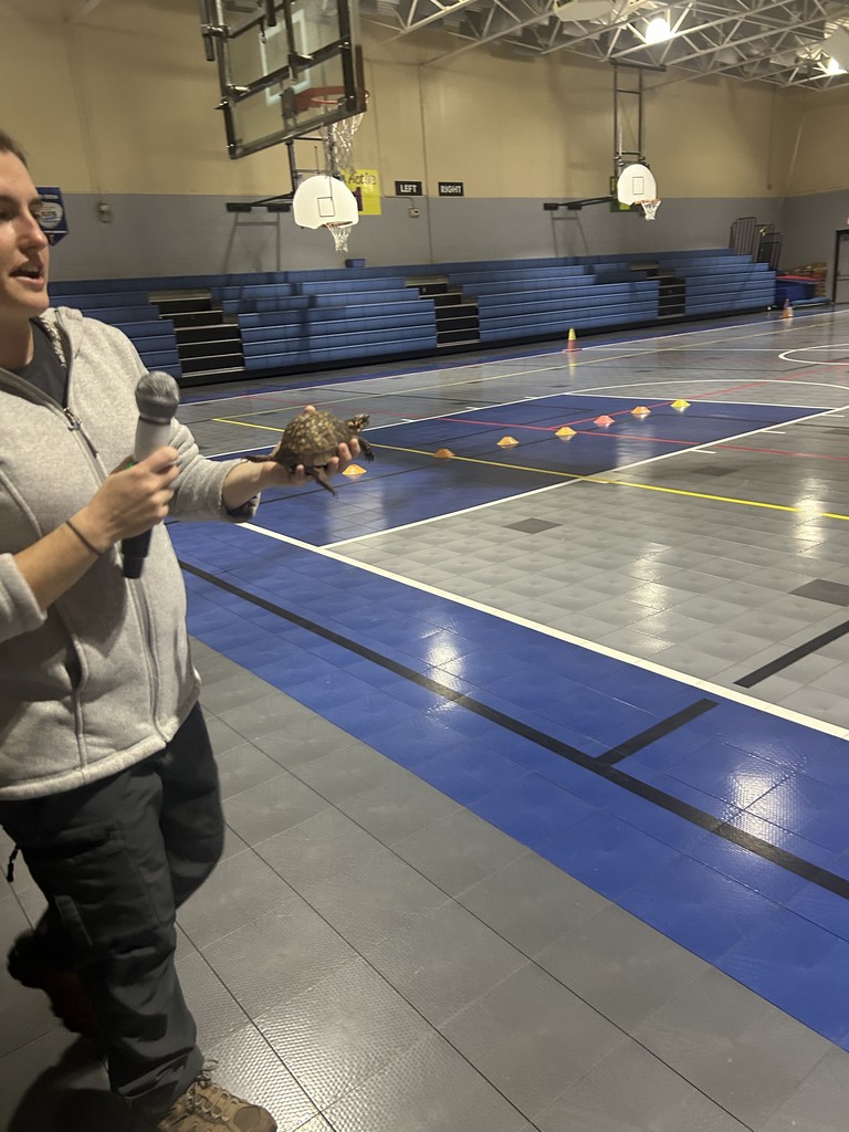 Emily Hutto from Jefferson County Greenway with turtle