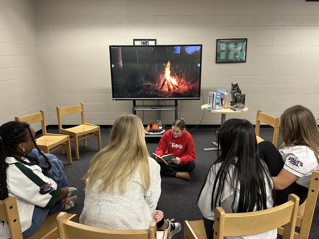 students telling ghost stories