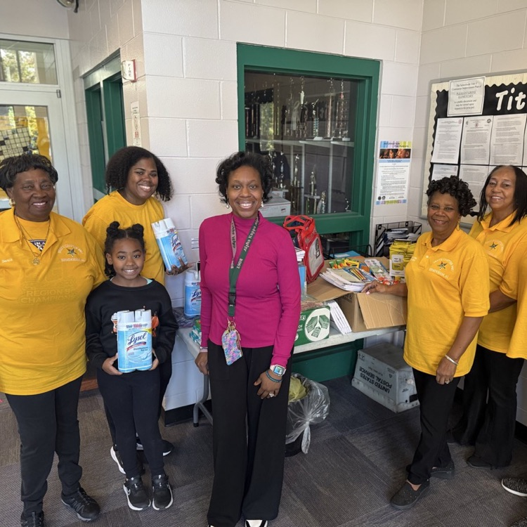 A group of ladies posing for the picture.