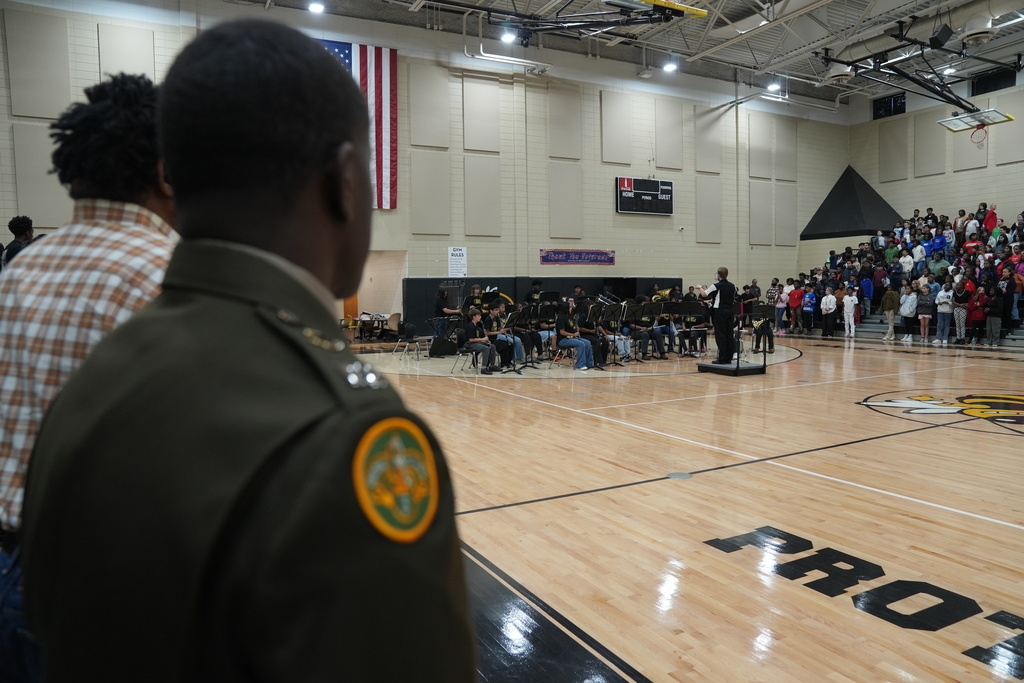 Band students perform for a crowd inside McAdory Middle School's gym.