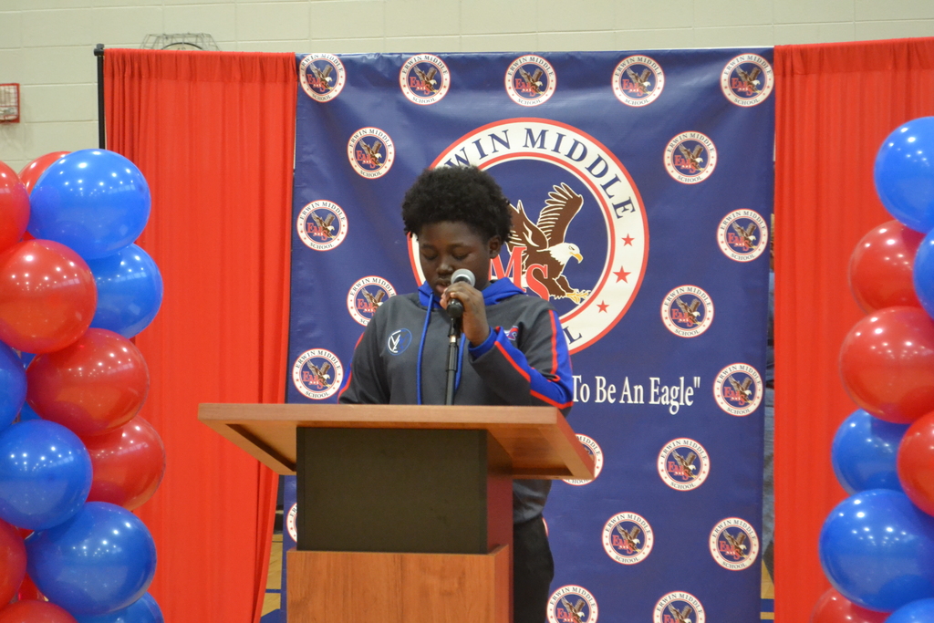 A student reading a poem