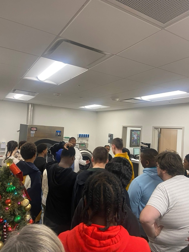 Hueytown students listen to a speaker on a tour of UAB Medical West.