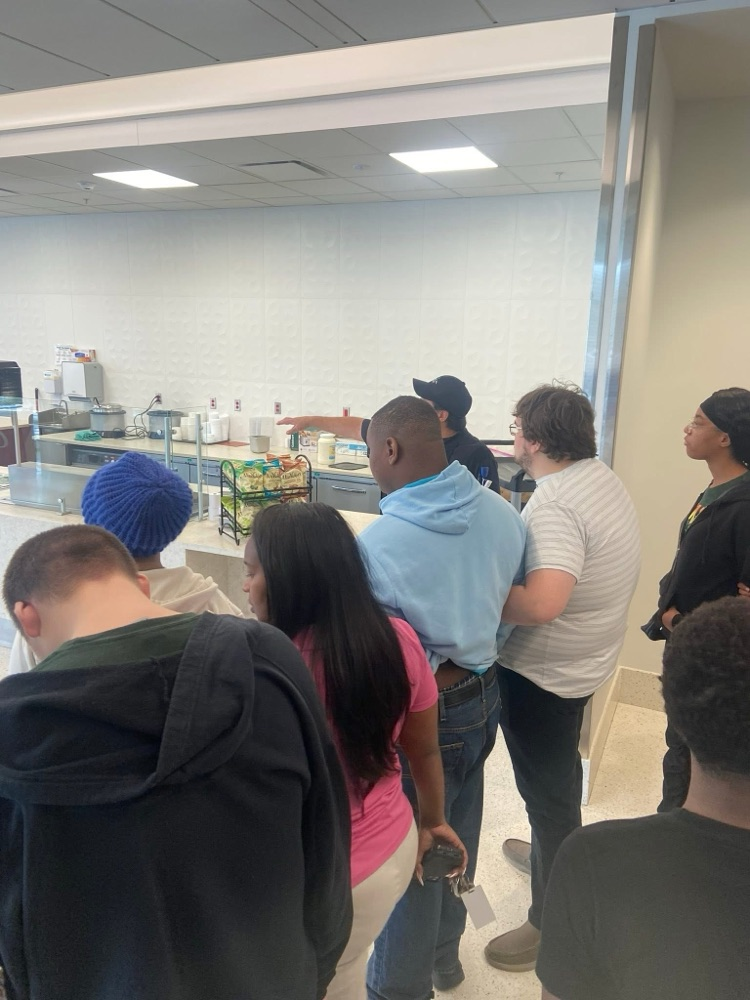 Hueytown students listen to a speaker on a tour of UAB Medical West.