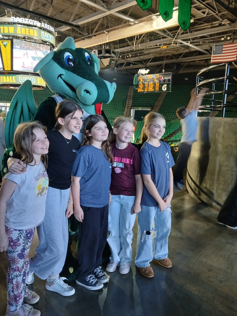students at basketball game