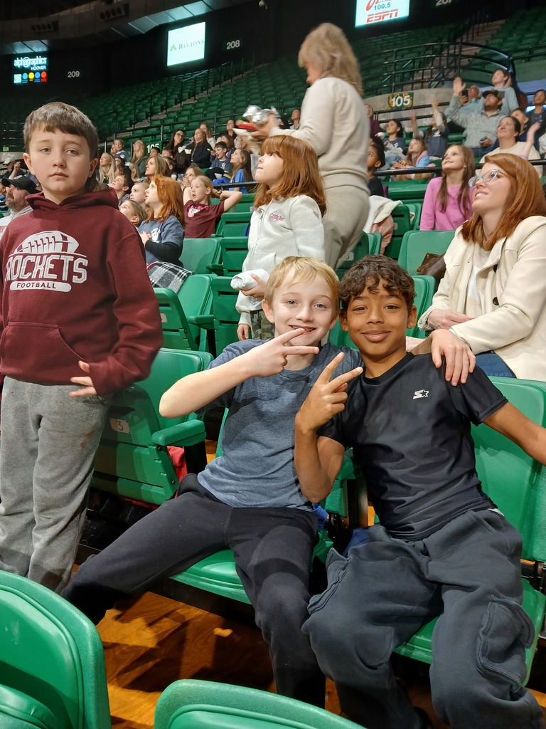 students at basketball game
