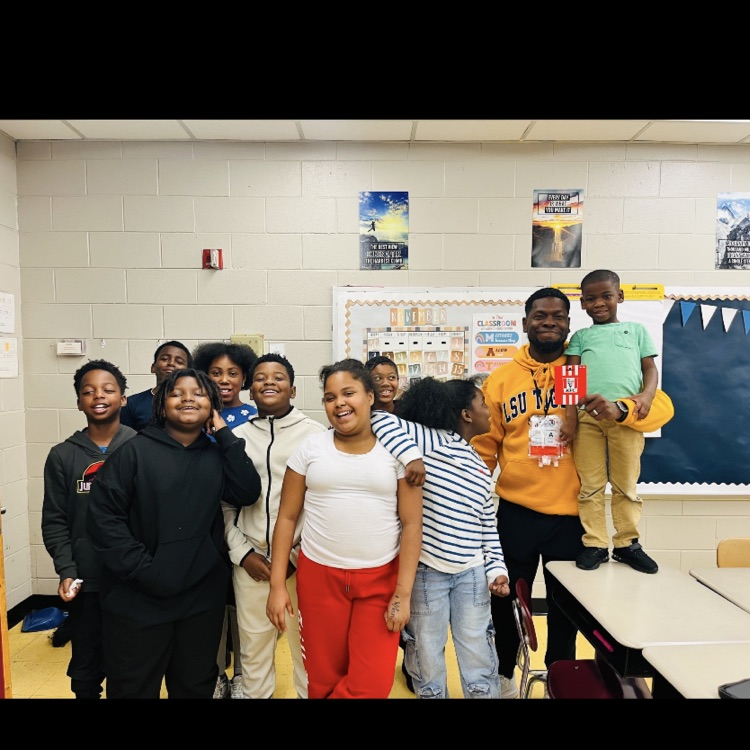 A picture of Mr. Williams' class because they won the song of the week.