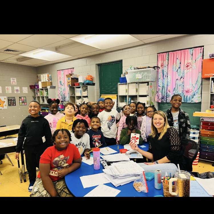 A picture of Ms. Flory's class because they won the song of the week.