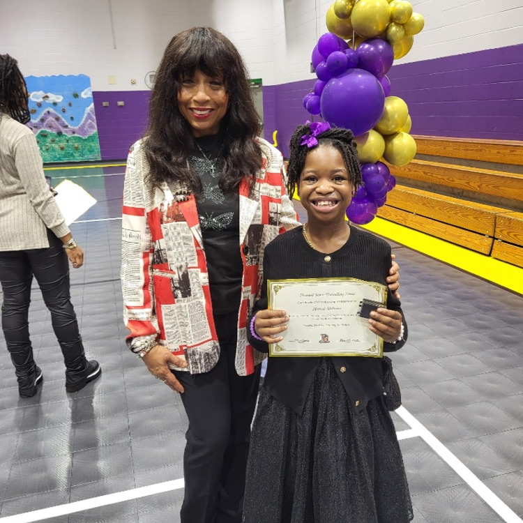 A picture of Ms. Byrd and Messiah who is a Superior Spartan Spartan.