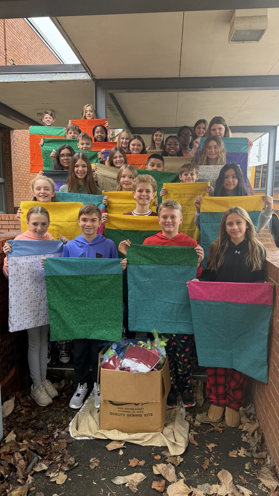 students with pillowcases