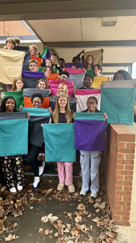 students with pillowcases