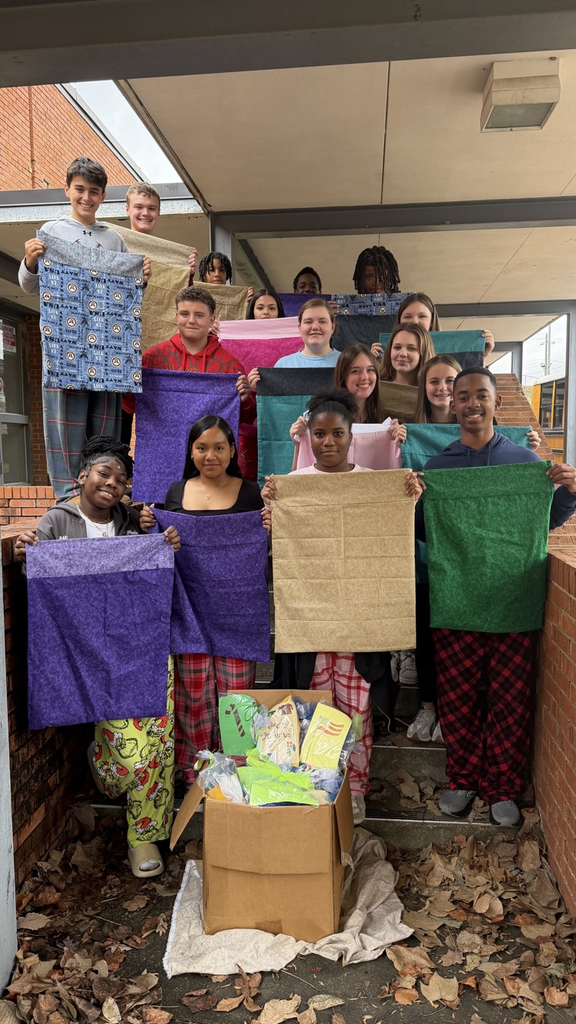 students with pillowcases