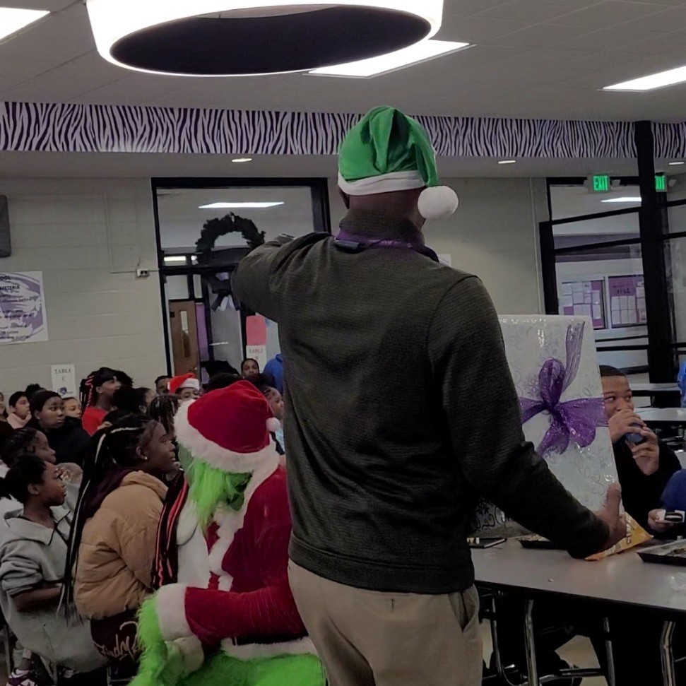 Principal Everett points out Grinch to SRO