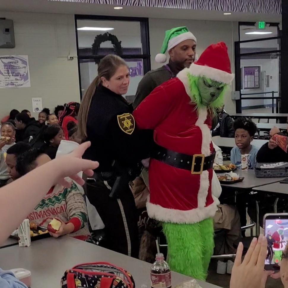 The Principal and SRO nab the Grinch.
