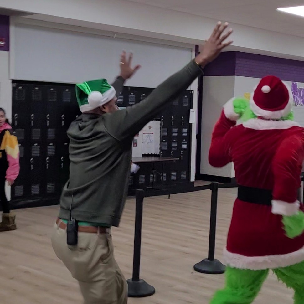 Principal Everett chases the Grinch down.