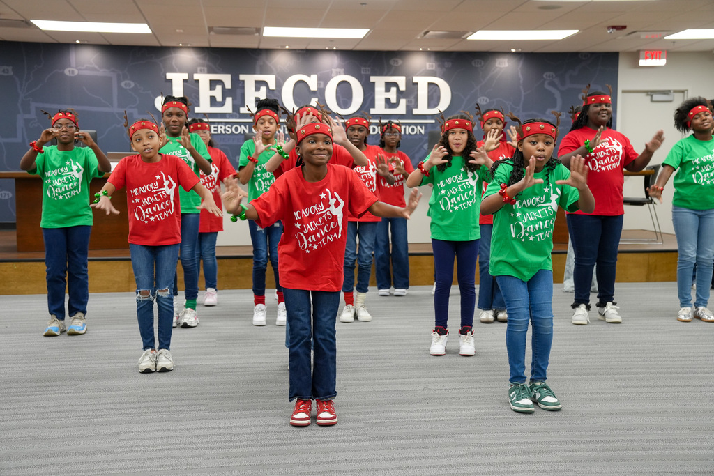 McAdory Elementary School Interpretive Dance Team performs inside JEFCOED board room.