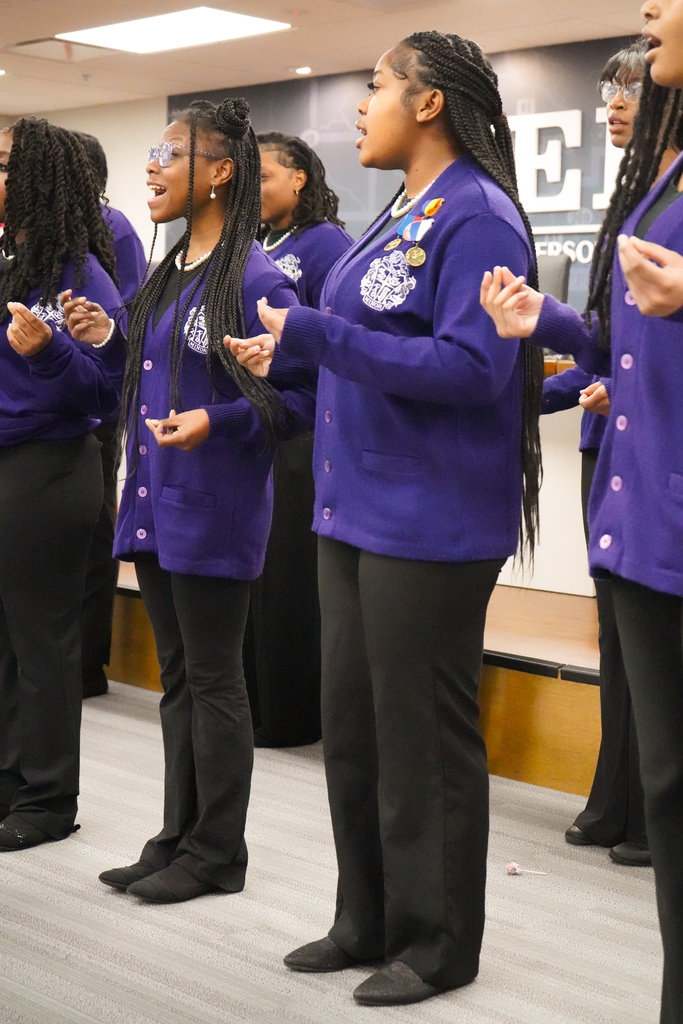 Minor High School concert choir performs inside JEFCOED board room.