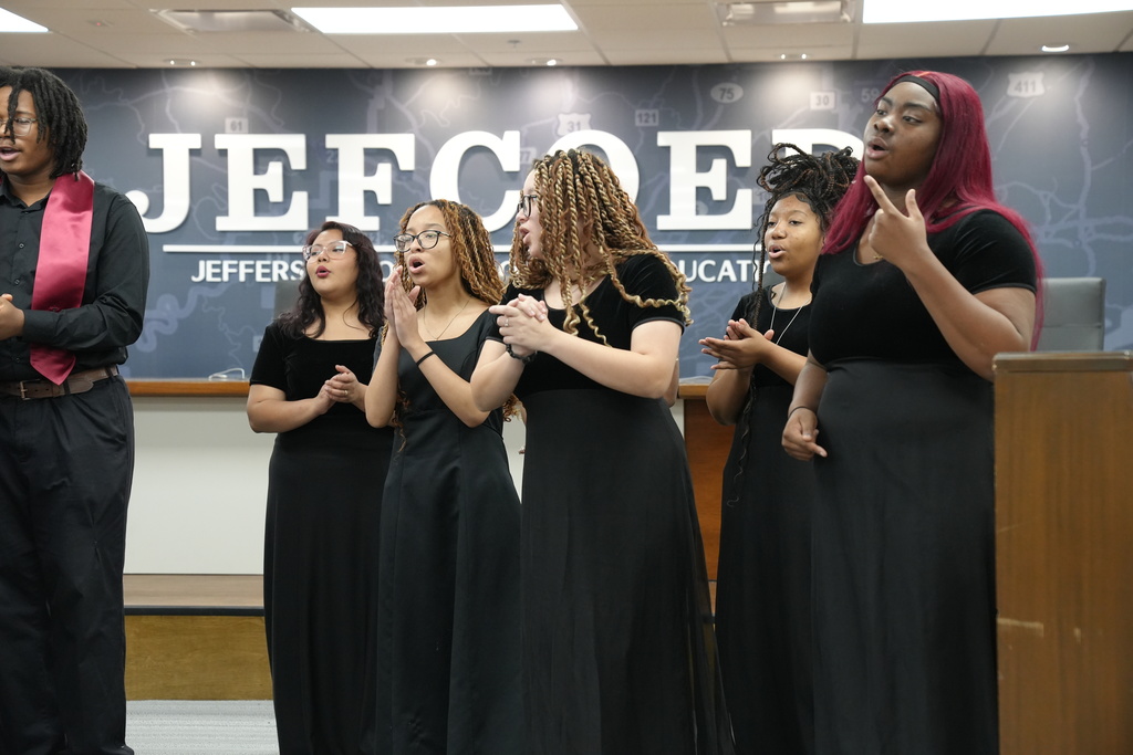 Shades Valley High School Valley Singers perform inside JEFCOED board room.
