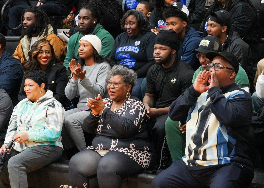 A crowd shouts and claps happily during National Signing Day at McAdory High School. 
