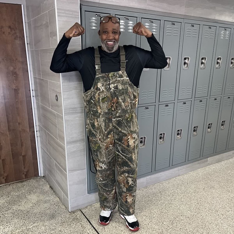 Mr.D making flexing his arms