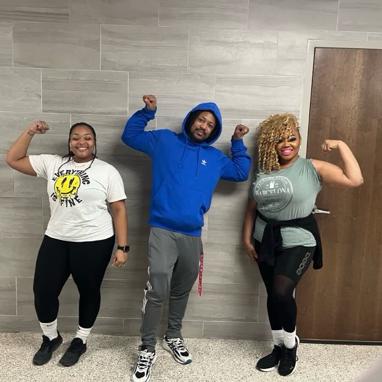 several teachers posing in athletic wear