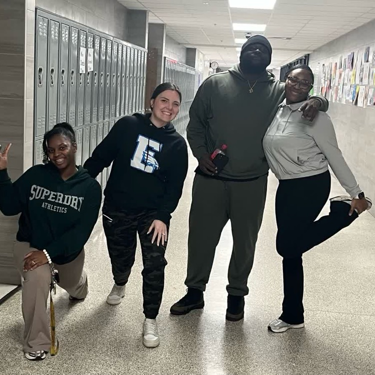 several teachers posing in athletic wear