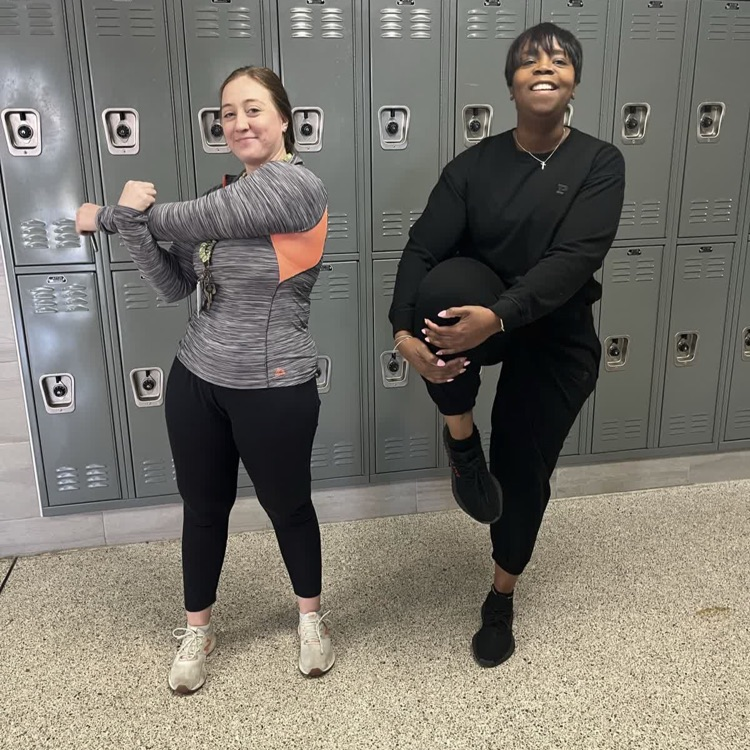 several teachers posing in athletic wear